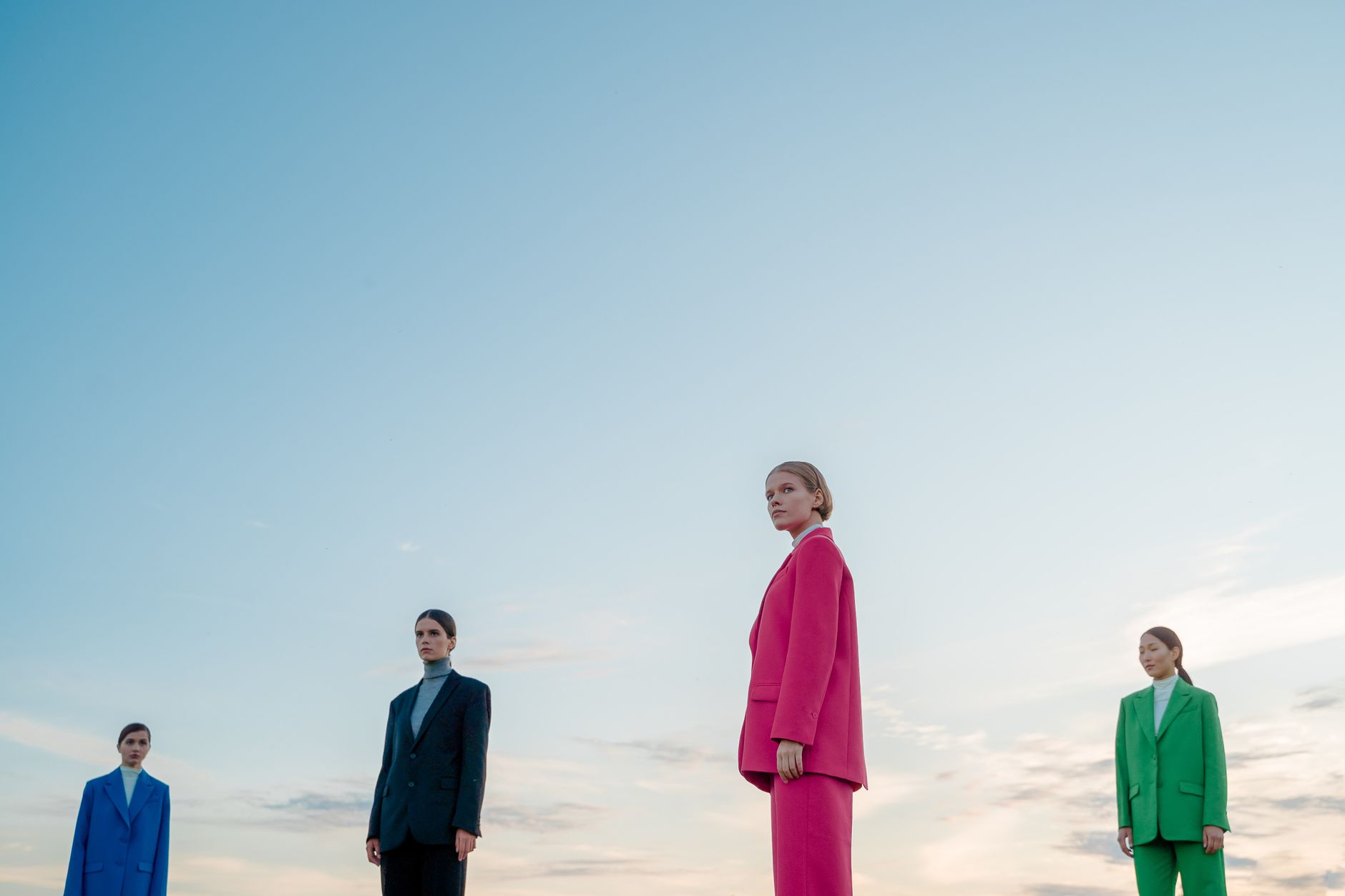 Tailored suit styling in minimalist light studio