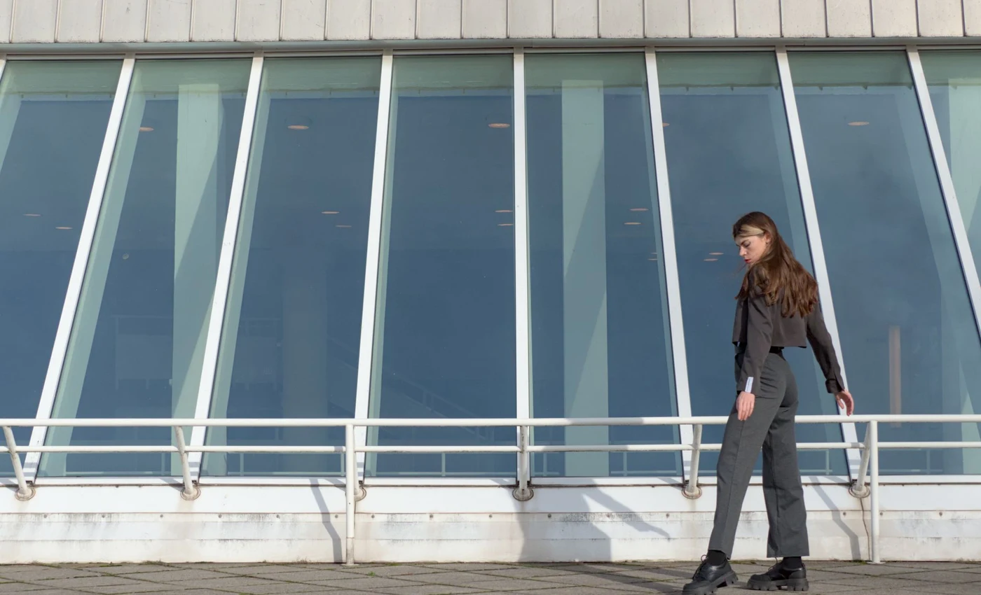 Full body fashion model styled outfit modern architecture